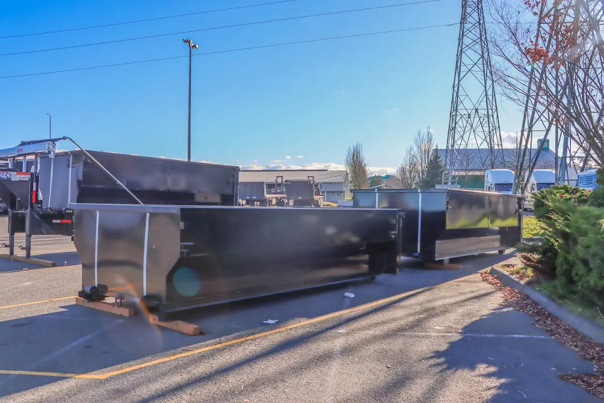 Roll-off dumpster ready for waste disposal at job site for 2 Yard Dumpster Rental in Red Hook